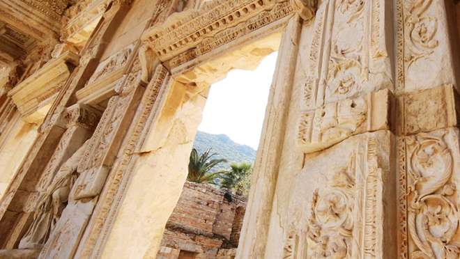 Admire sun-kissed ancient marble by the sea
