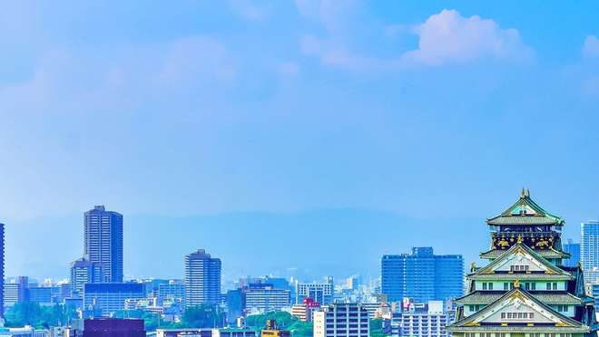 Savour sizzling street eats in vibrant Osaka