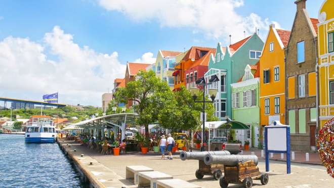 Enjoy sun-drenched pastel streets and ocean breeze