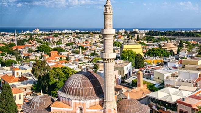 Wander sun-drenched streets in vibrant Rhodes