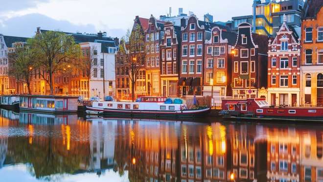 Glide through gorgeous canals in Amsterdam