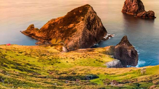 Feel warm ocean breezes on soft golden sands